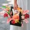 Túi hoa quà tặng mix mẫu đơn tú cầu tone hồng đỏ