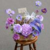 Giỏ hoa mix tú cầu tulip lá môn tone tím